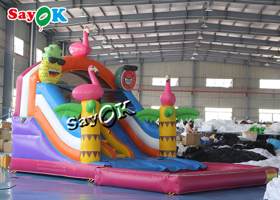 Blow Up Slip N Slide Commerciële opblaasbare glijbaan Kleurvolle PVC-doek opblaasbare uitschuiver glijbaan met zwembadset